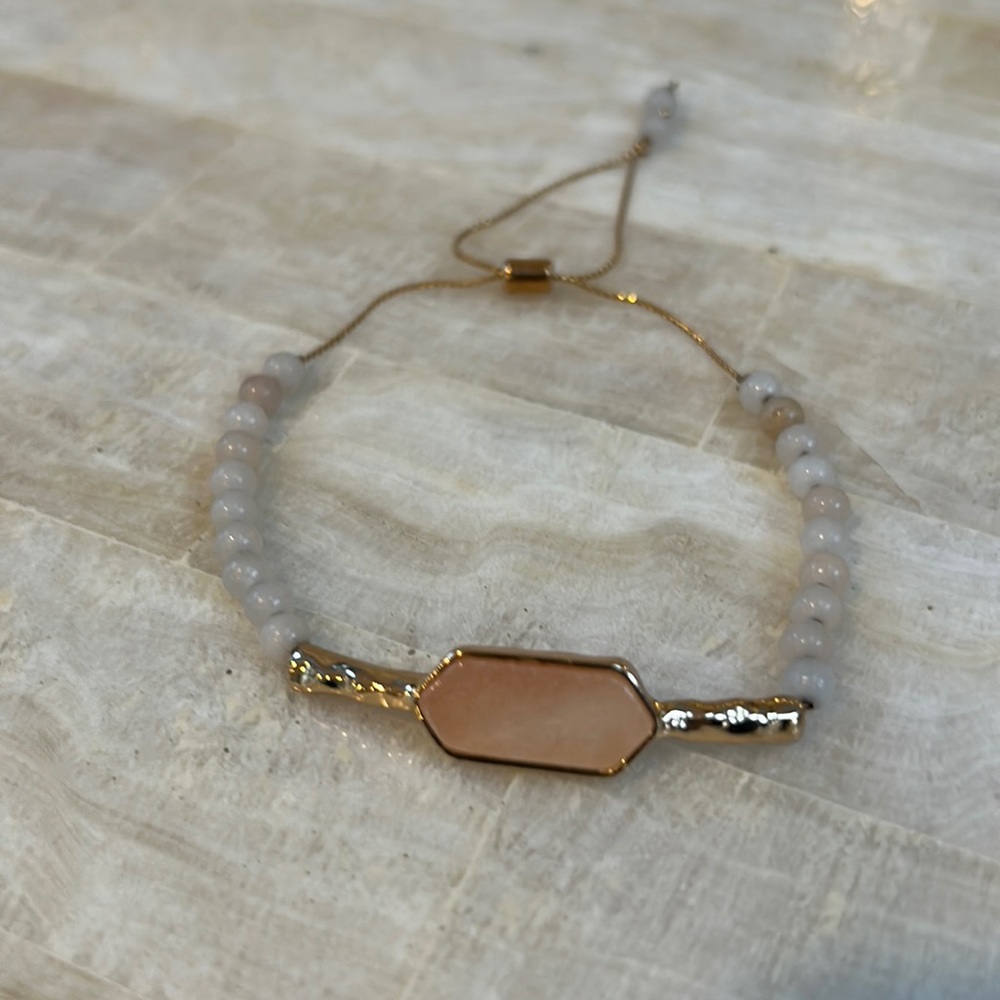 Woman’s Beaded bracelet with tightening rope to fit.